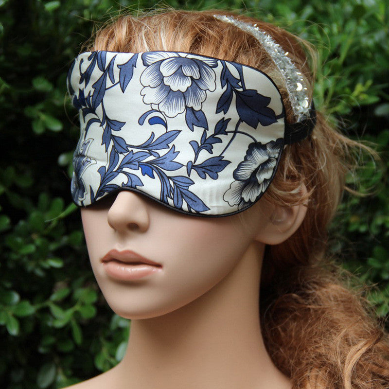 Mulberry silk sleep mask laid flat, displaying the double-sided silk fabric