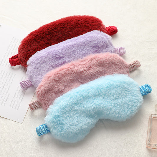 Plush blackout sleep mask in soft imitation fur for cozy comfort