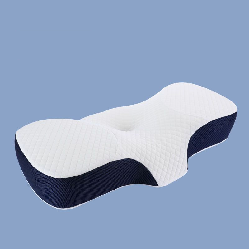 Butterfly memory foam neck pillow shown on a bed, highlighting the slow-rebound foam
